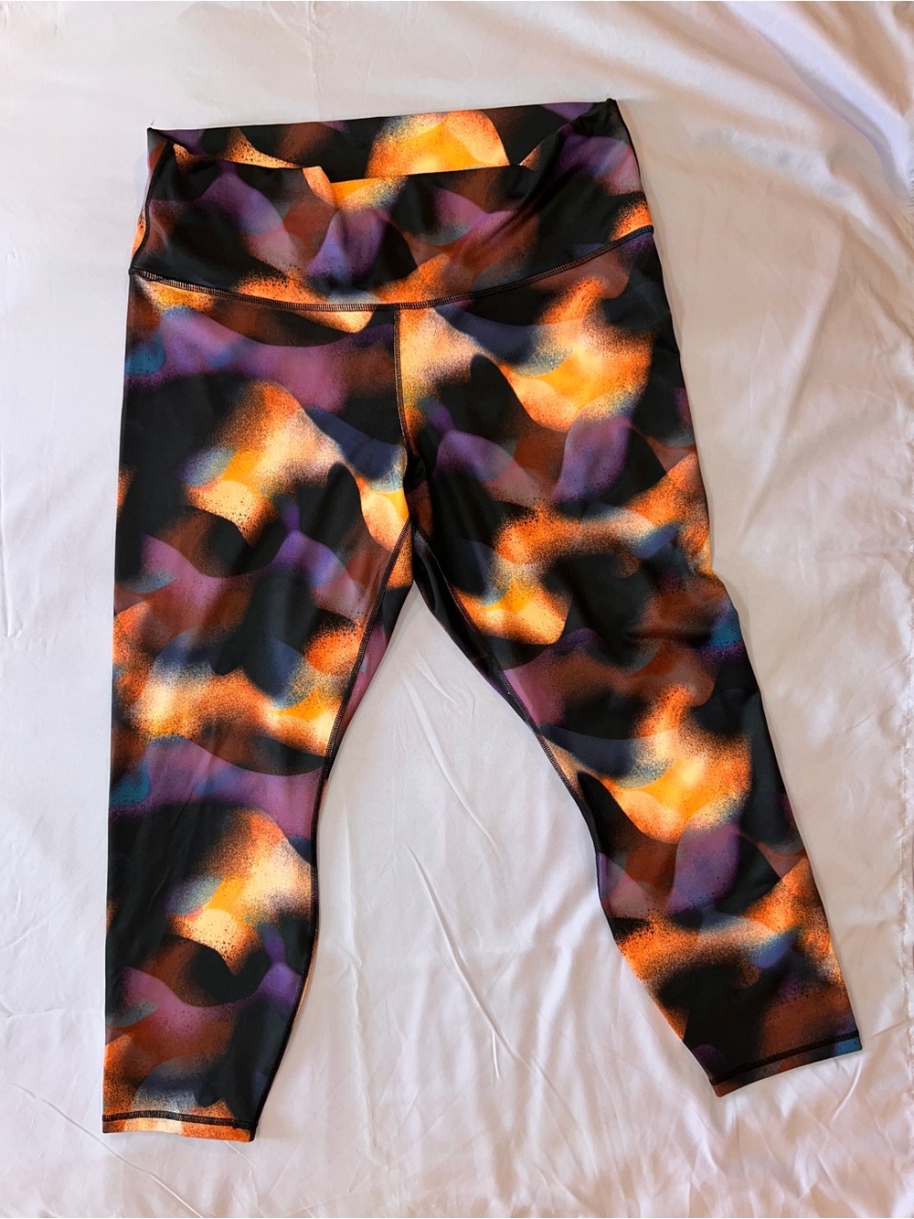 Fabletics PowerHold High-Waist Capri Leggings - Peach, Purple & Black